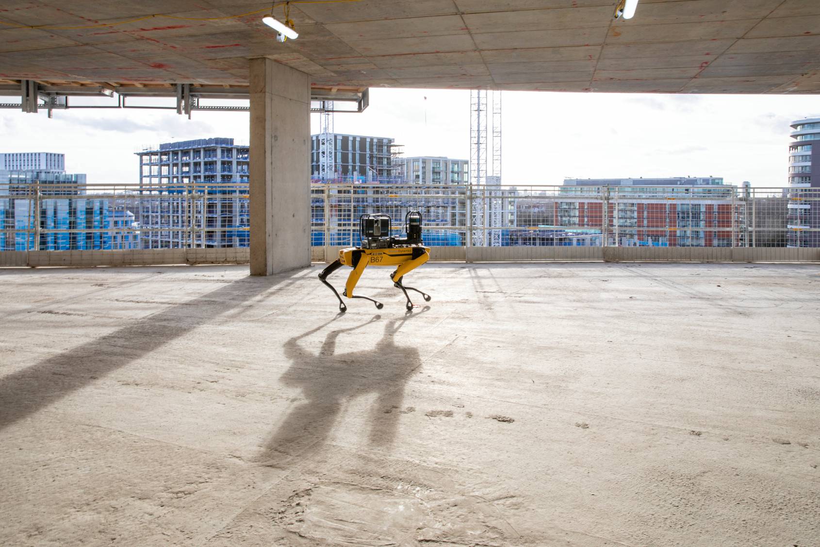 Spot equipped with a laser scanner on a construction site