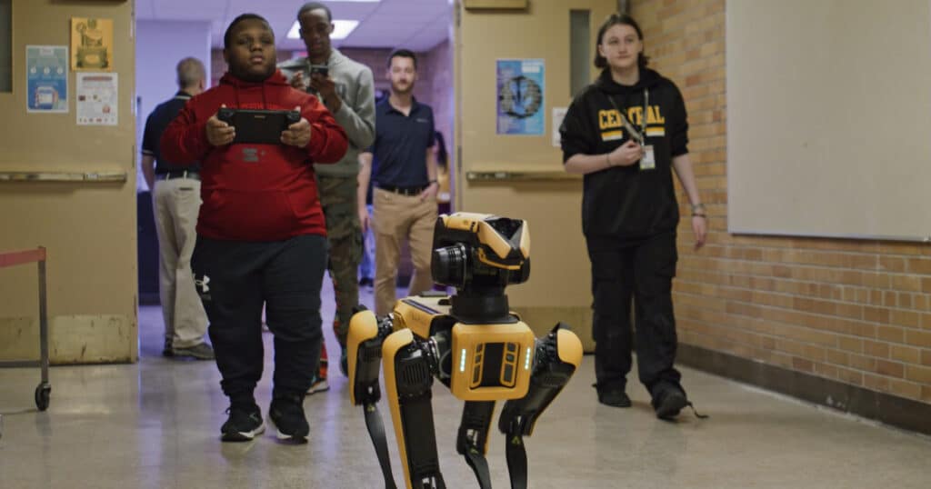 Central High students drive Spot through the school