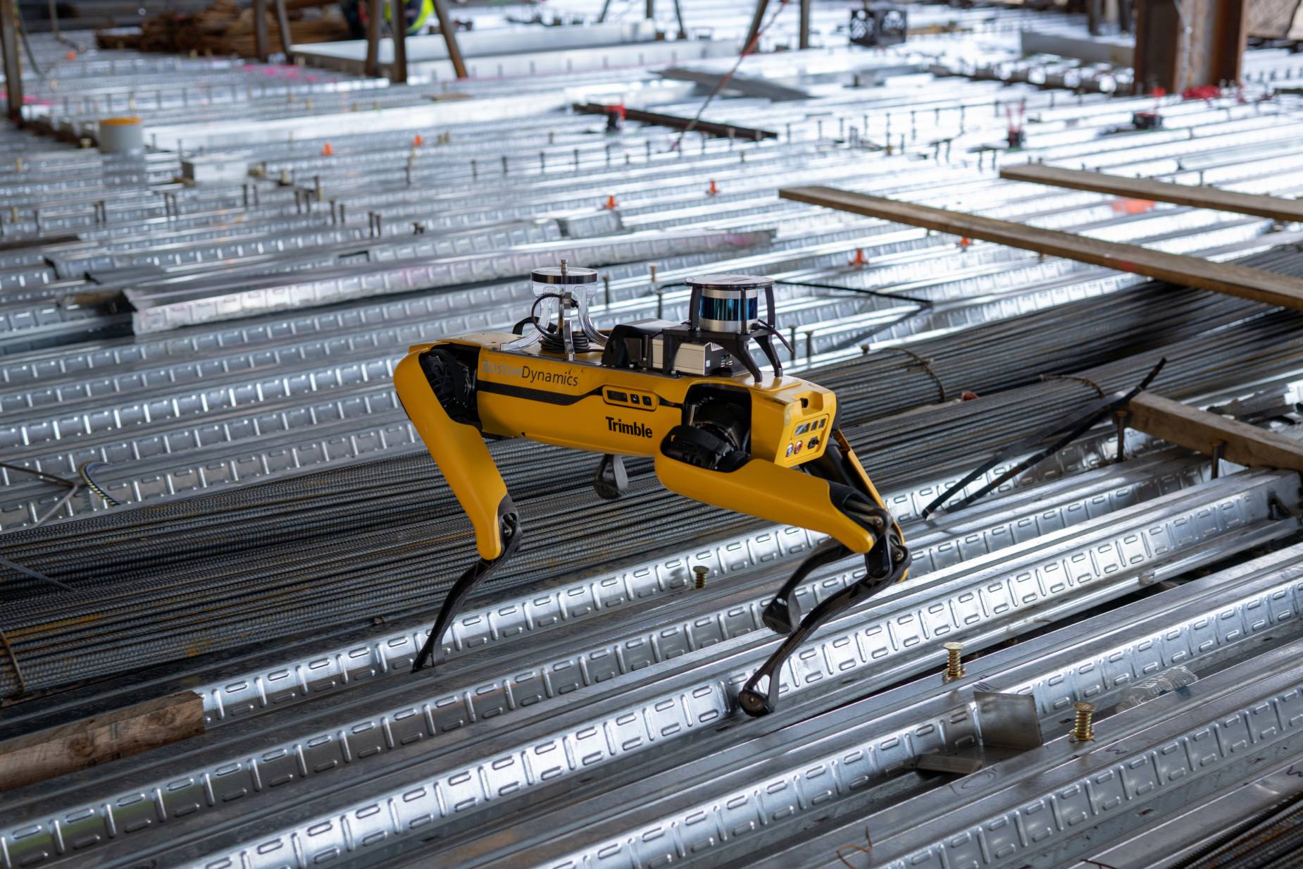 A Spot robot navigates a jobsite