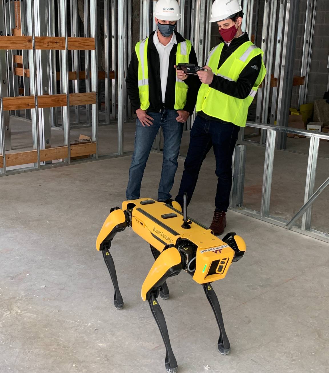 Operators working with Spot on a construction site