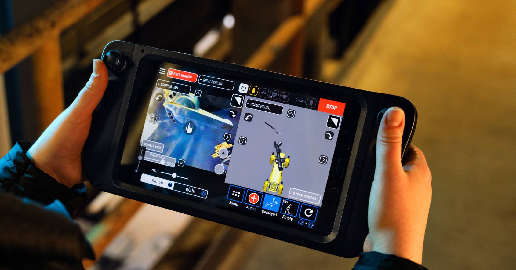 An operator completes remote manipulation tasks from the Spot tablet controller